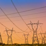 Electric Power Lines and Transmission Tower, Electric grid at sunset