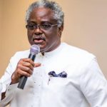 chris-asoluka-696×595